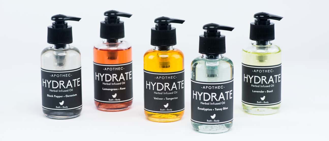Assembled colorful skincare products with monochrome labels.