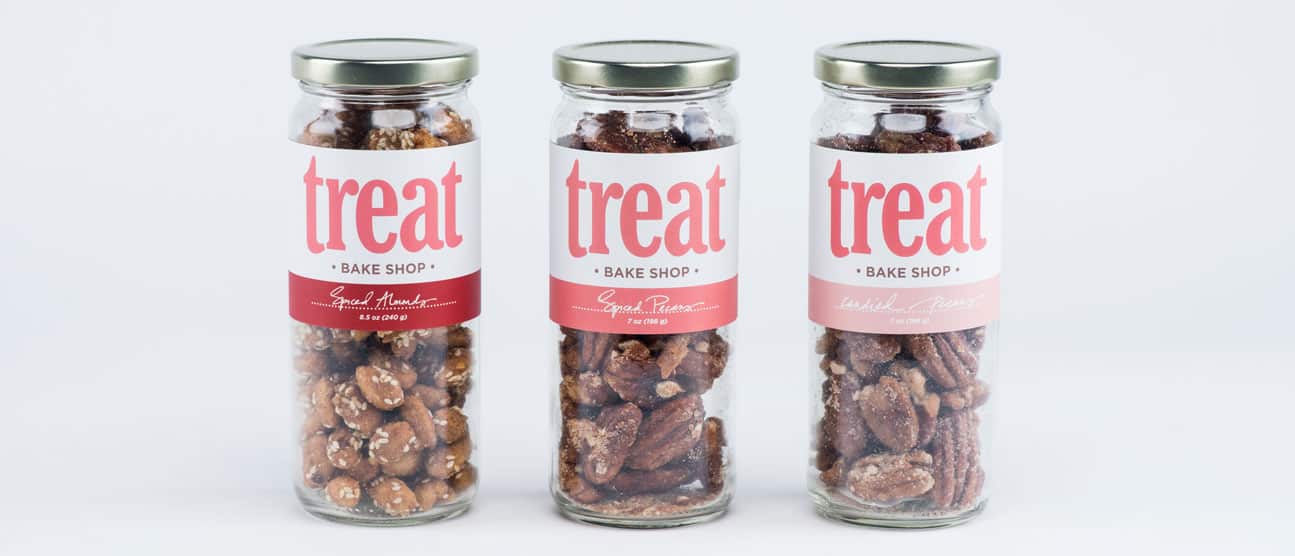 Spiced nuts from Treat Bakeshop in glass jars.
