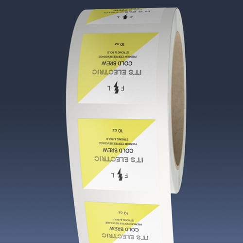 Label roll mockup showing roll direction number one. The top edge of the design comes off the roll first.