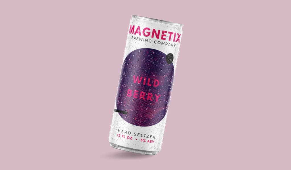 Digital mockup of a hard seltzer product against a light pink background. The hard seltzer label is white with magenta text and a purple graphic. The flavor is wild berry.