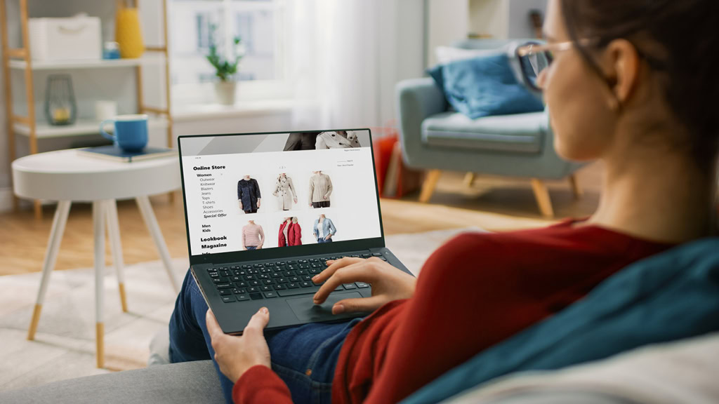 woman on laptop looking at online store for an e-commerce business