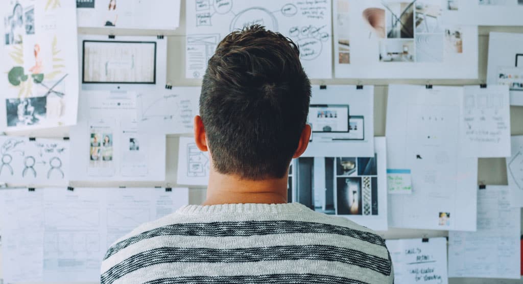 Person brainstorming and developing a new product.